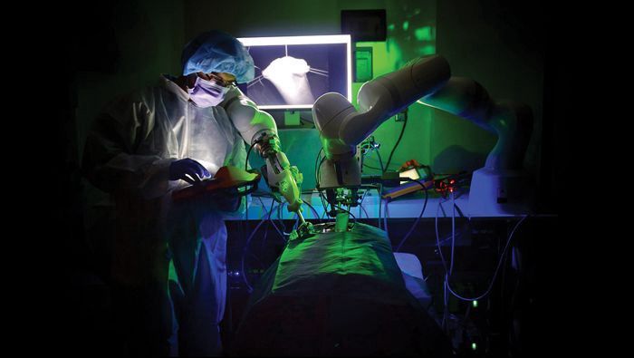 Robot assisting with intestinal surgery. Source: Nature