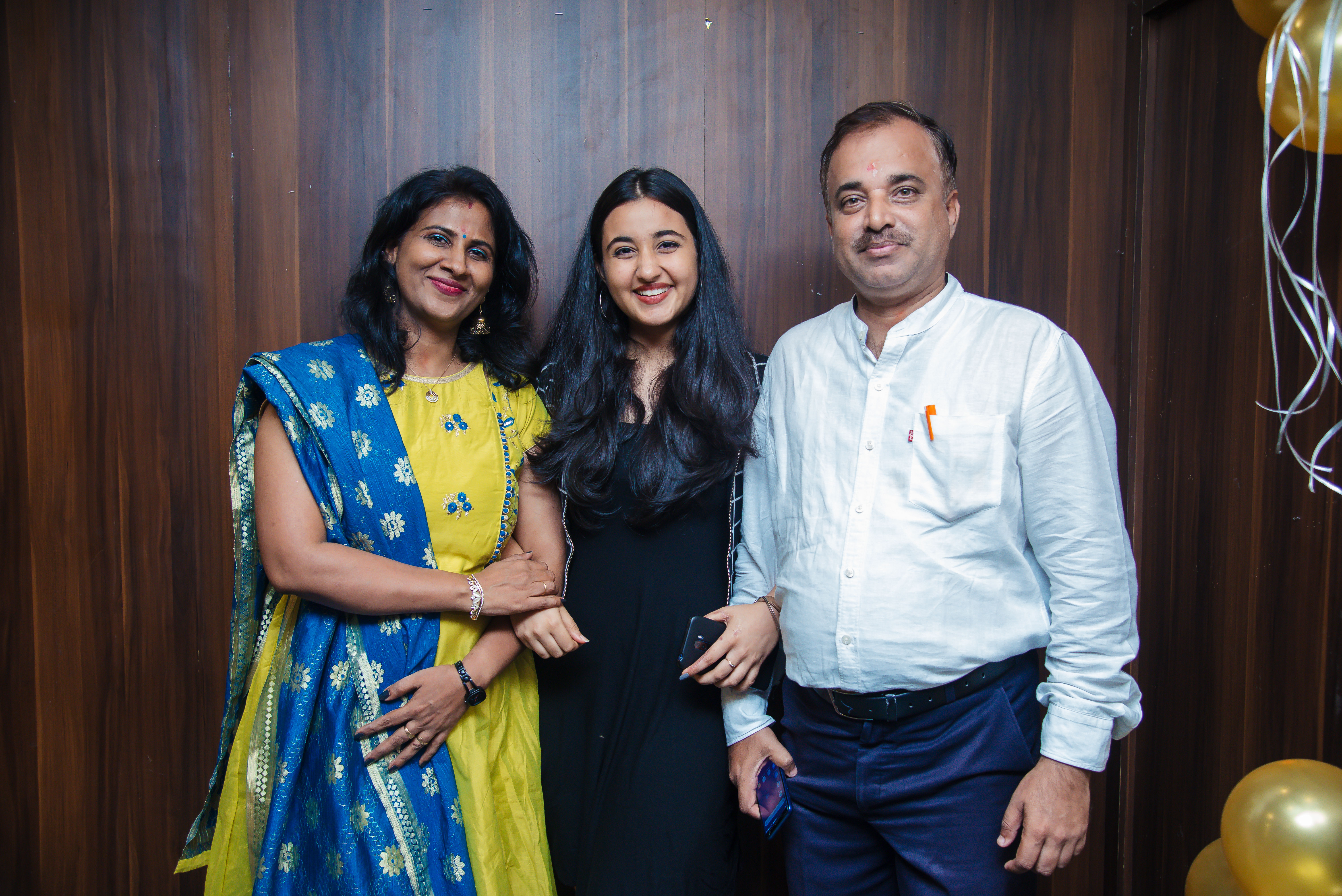 Revathi with her parents
