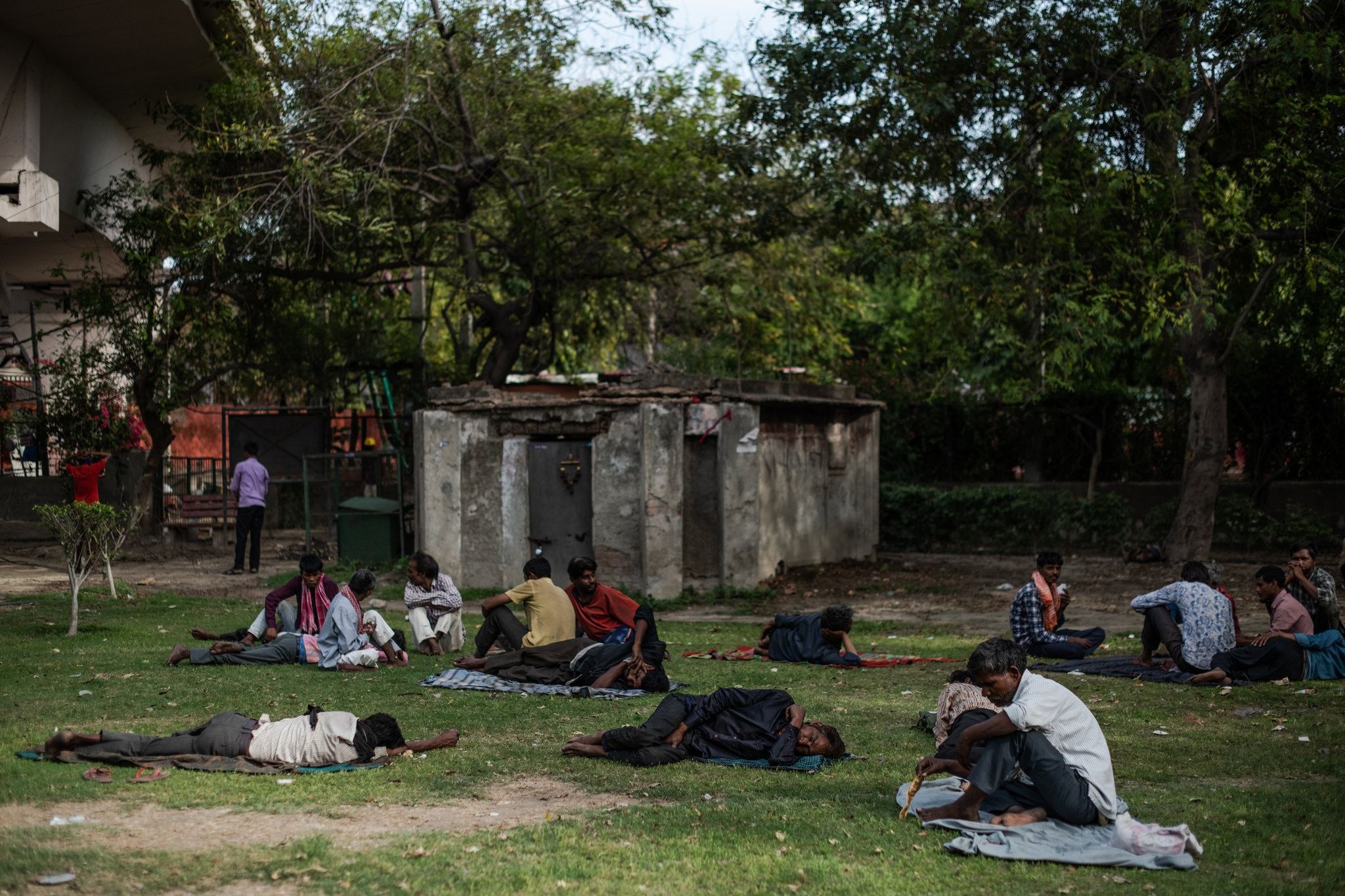 Migrant workers in a park in Delhi
