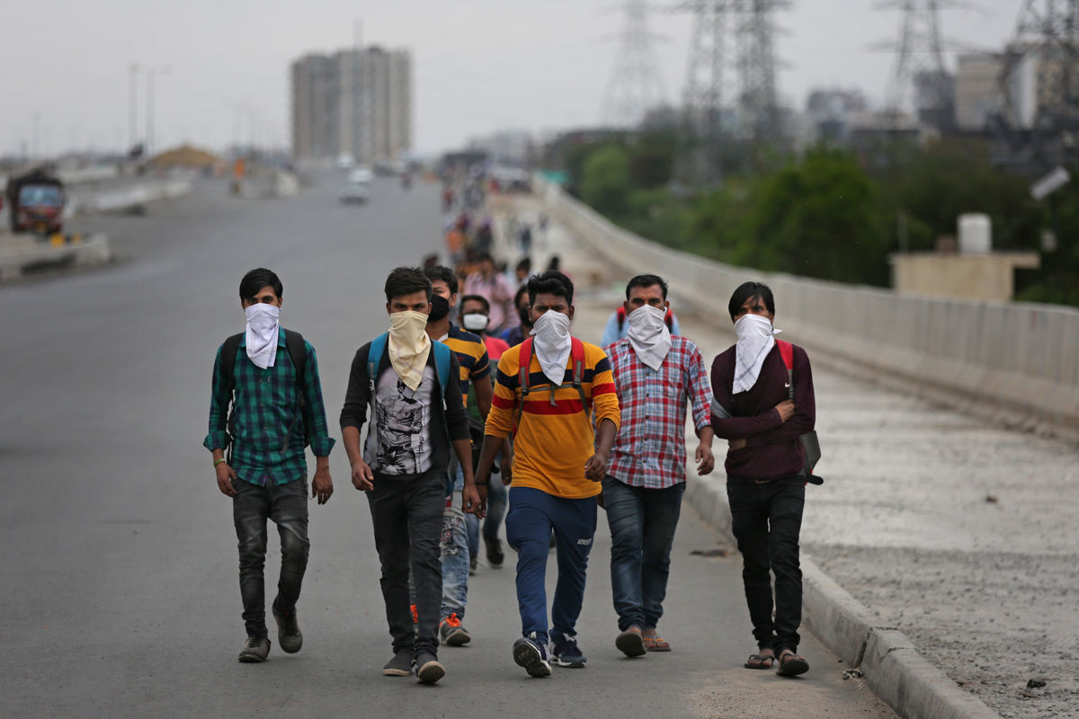 Some of the 25 million migrant workers on the roads; but will they return to the cities?