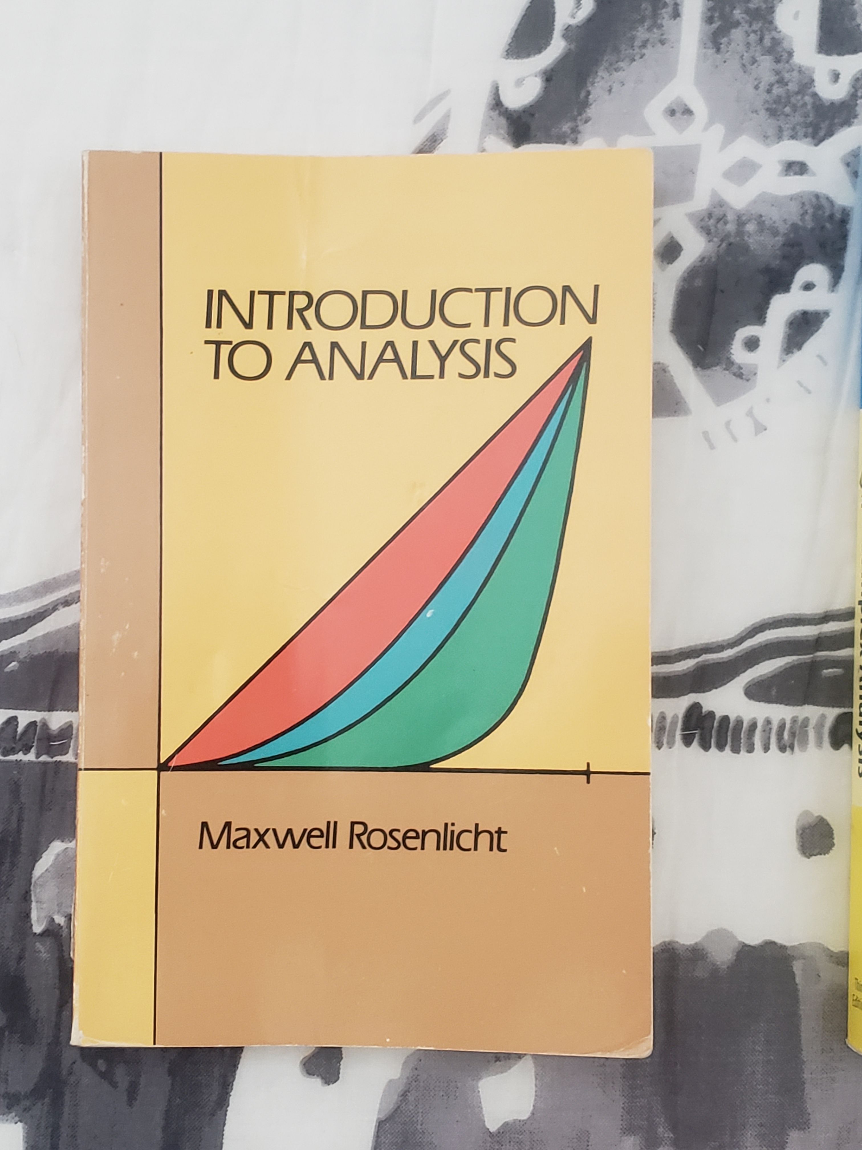 “Introduction to Analysis” by Maxwell Rosenlicht, Dover Publications