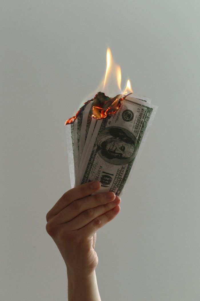 Negative rates would be like burning people’s savings. Photo by Jp Valery on Unsplash