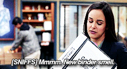 Amy Santiago from Brooklyn 99 with a lovely folder.