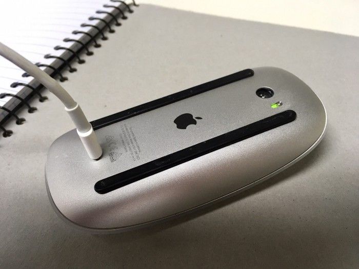 A Magic Mouse 2, with it’s belly upwards, being charged — courtesy of Stack Exchange
