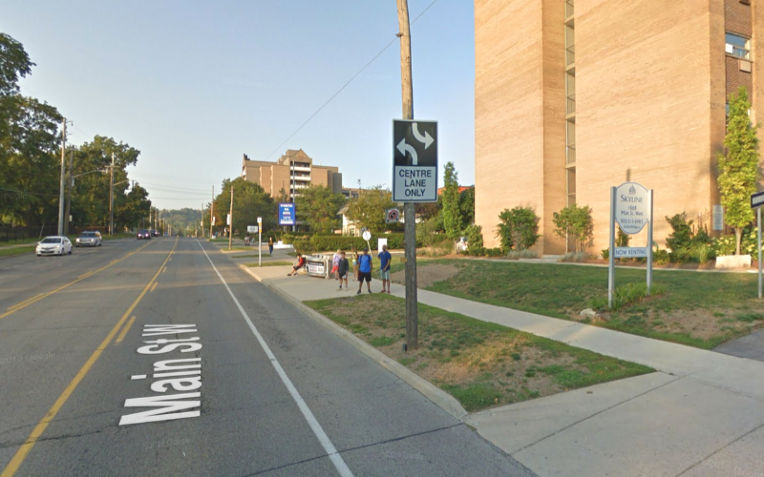 This is a picture of the exact place. Wanna guess who’s the one with the blue T-shirt and red shorts?
