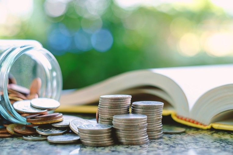 Book-buying money: Photo via Shutterstock