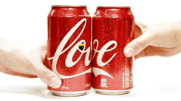 Two Cola cans completing each other. Source: Coca-Cola.