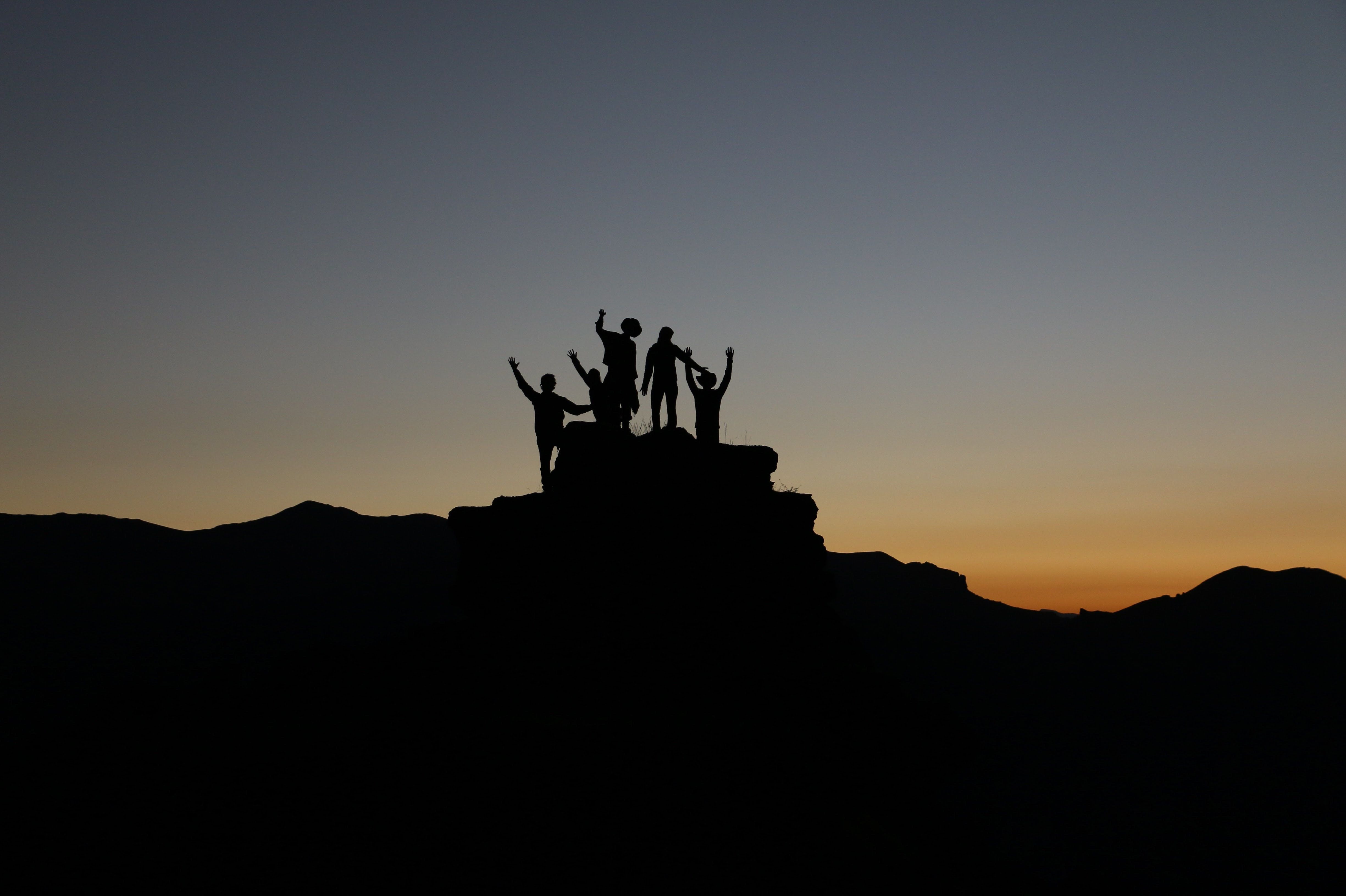 A group conquering a peak